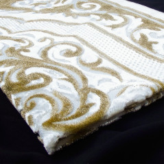 Opalescent velvet rug, gold colour, central "arabesque" pattern
